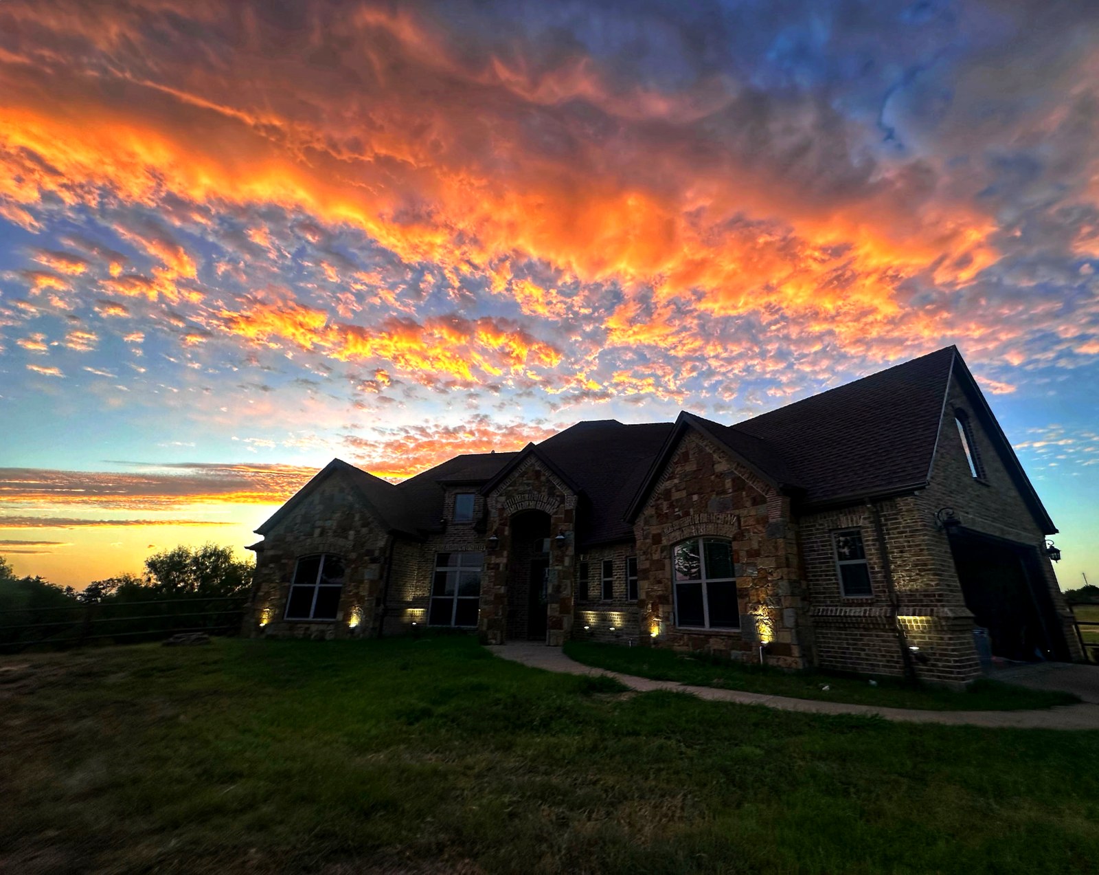 Sunset over the house at Flying Spur Ranch