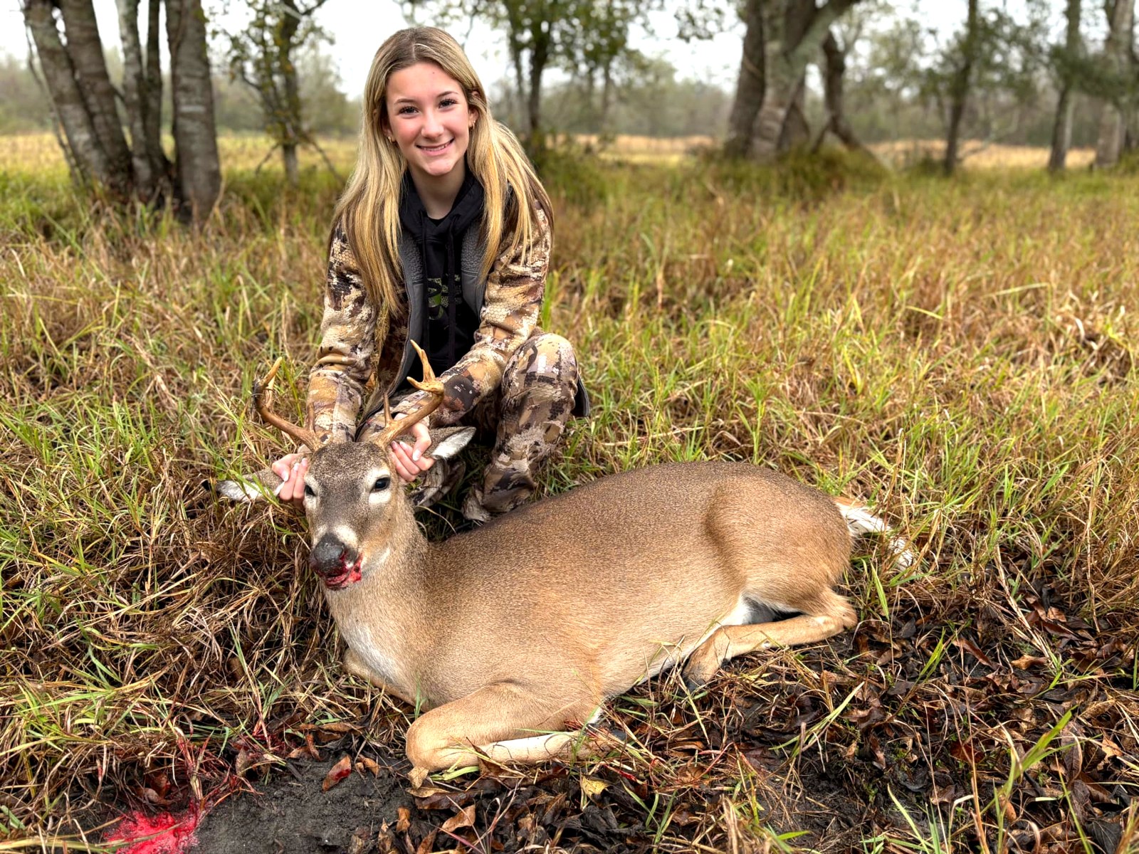 Morgan with a cull buck